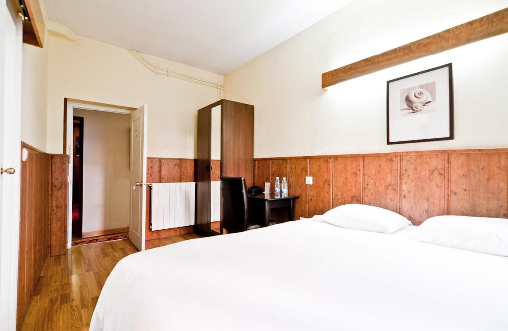 Hostal Asuncion Мадрид Номер фото